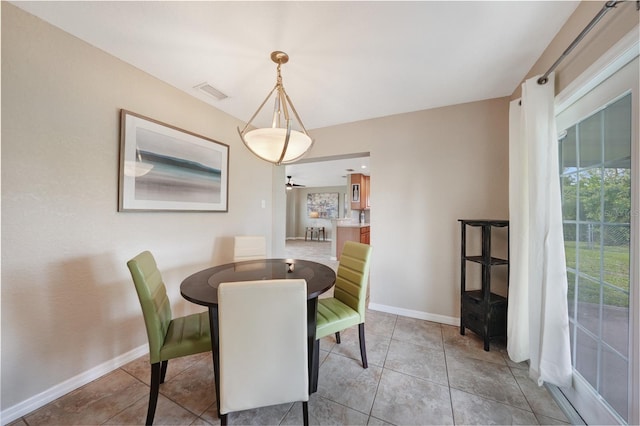 3171 Highlands Rd, Punta Gorda, FL 33983 - dining room with baseboards and ceiling fan