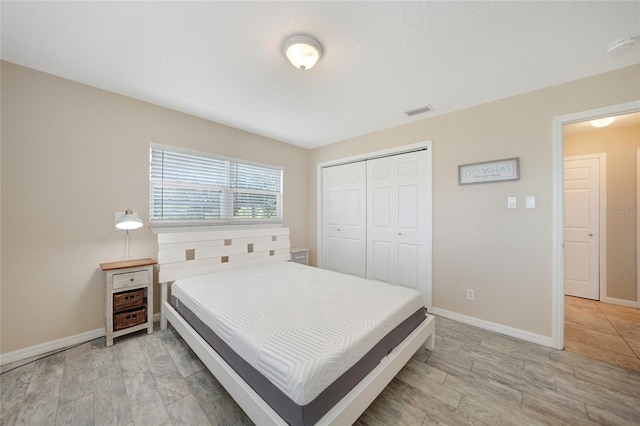 3171 Highlands Rd, Punta Gorda, FL 33983 - bedroom featuring light wood finished floors and a closet
