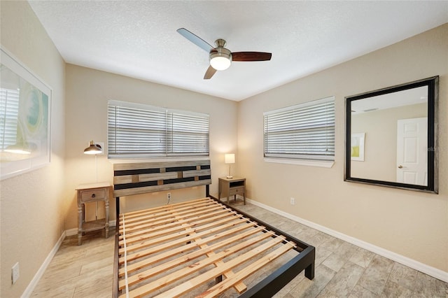 3171 Highlands Rd, Punta Gorda, FL 33983 - bedroom featuring ceiling fan and a textured ceiling