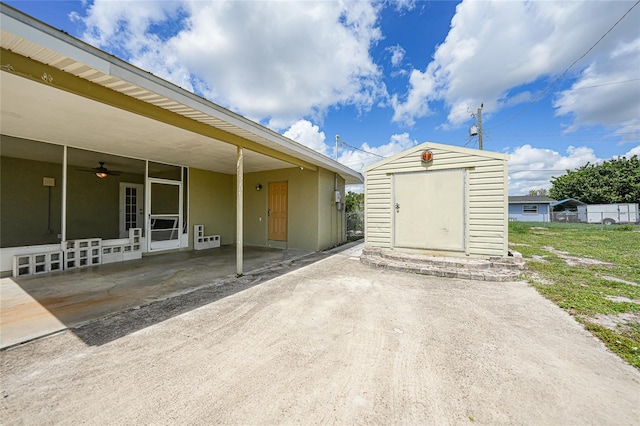 3171 Highlands Rd, Punta Gorda, FL 33983 - view of patio featuring a shed and a ceiling fan