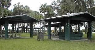3171 Highlands Rd, Punta Gorda, FL 33983 - surrounding community with a gazebo and a lawn