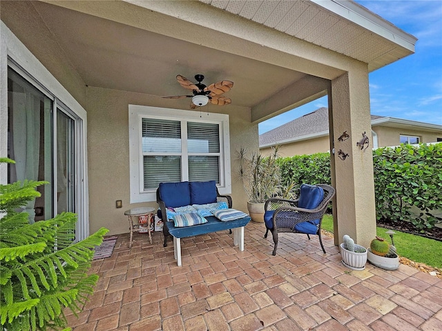 7292 Mikasa Dr, Punta Gorda, FL 33950 - view of patio / terrace featuring ceiling fan and an outdoor hangout area