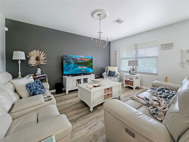 7292 Mikasa Dr, Punta Gorda, FL 33950 - living area featuring light wood-type flooring and baseboards