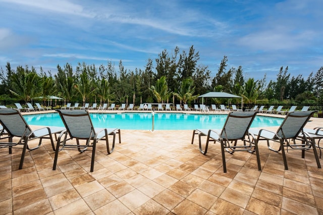 7292 Mikasa Dr, Punta Gorda, FL 33950 - community pool featuring a patio