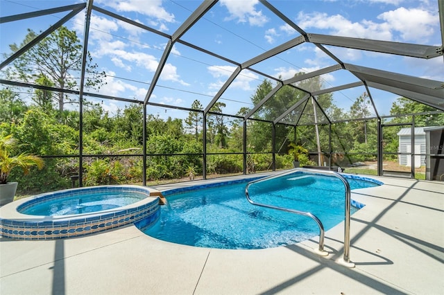 1444 Frisco Ter, Port Charlotte, FL 33953 - view of swimming pool featuring a pool with connected hot tub, a patio area, glass enclosure, and a storage unit