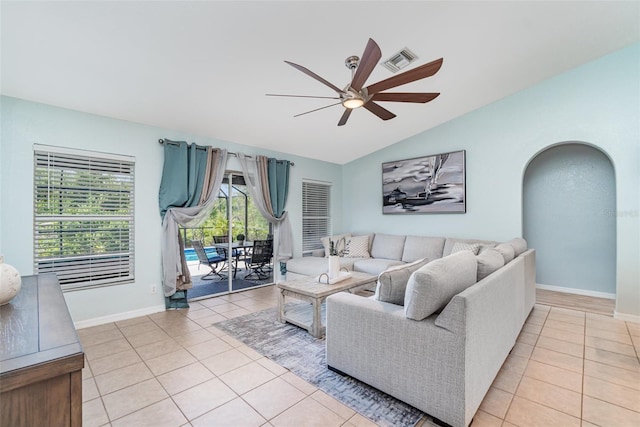 1444 Frisco Ter, Port Charlotte, FL 33953 - living room featuring ceiling fan, light tile patterned flooring, lofted ceiling, and baseboards