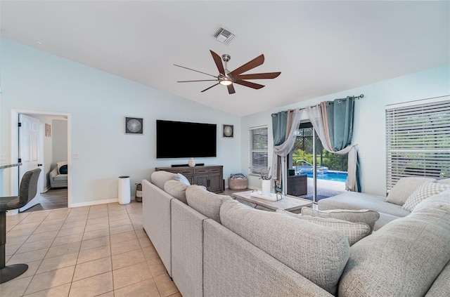 1444 Frisco Ter, Port Charlotte, FL 33953 - living area with a ceiling fan, light tile patterned floors, baseboards, and high vaulted ceiling