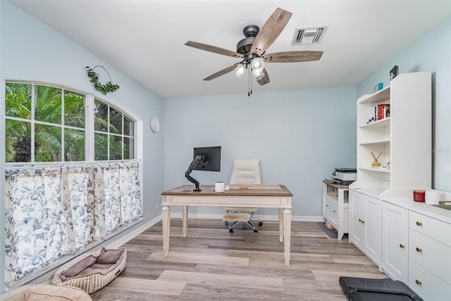 1444 Frisco Ter, Port Charlotte, FL 33953 - office area featuring ceiling fan, light wood-style flooring, and baseboards