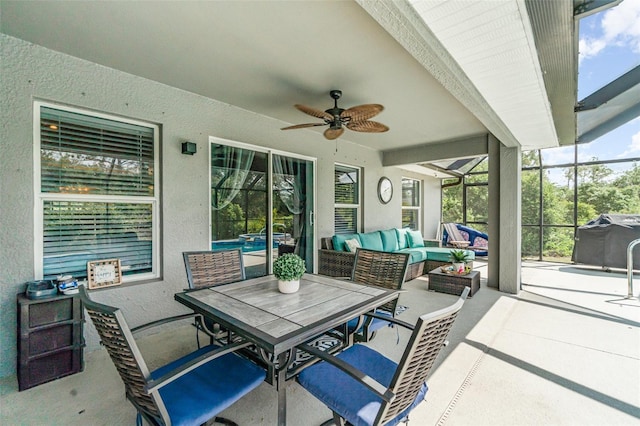 1444 Frisco Ter, Port Charlotte, FL 33953 - view of patio with a ceiling fan, outdoor lounge area, outdoor dining space, glass enclosure, and a pool