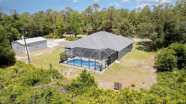 1444 Frisco Ter, Port Charlotte, FL 33953 - aerial view of property and surrounding area with a pool and a forest