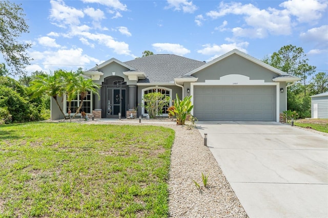 1444 Frisco Ter, Port Charlotte, FL 33953 - view of front of home featuring stucco siding, an attached garage, a front lawn, and driveway