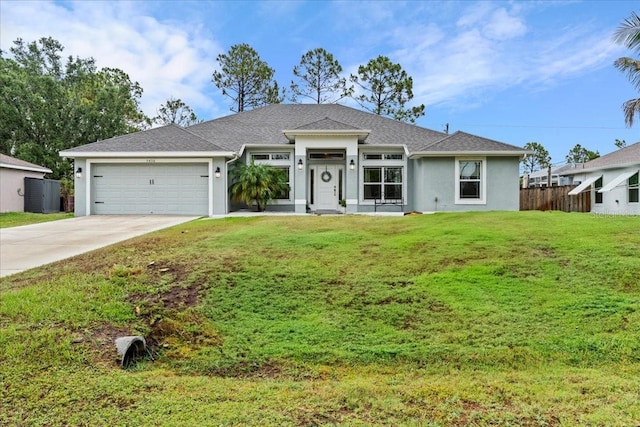 5436 Jessamine Ave, North Port, FL 34291 - view of front of property with stucco siding, driveway, a garage, and roof with shingles