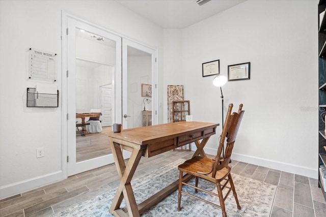 5436 Jessamine Ave, North Port, FL 34291 - office featuring wood tiled floors and baseboards