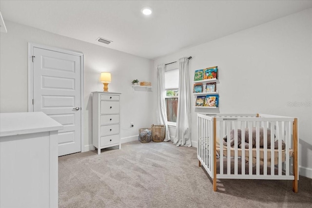 5436 Jessamine Ave, North Port, FL 34291 - carpeted bedroom featuring a nursery area and baseboards