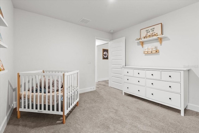 5436 Jessamine Ave, North Port, FL 34291 - bedroom with carpet floors, baseboards, and a crib