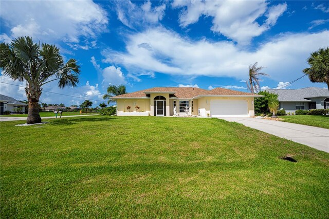 1 Sportsman Cir, Rotonda West, FL 33947 - single story home featuring an attached garage, driveway, stucco siding, and a front lawn