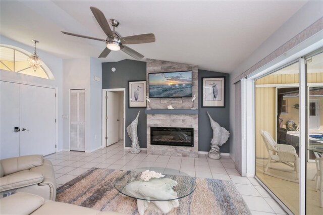 1 Sportsman Cir, Rotonda West, FL 33947 - tiled living area featuring lofted ceiling, a ceiling fan, and a large fireplace