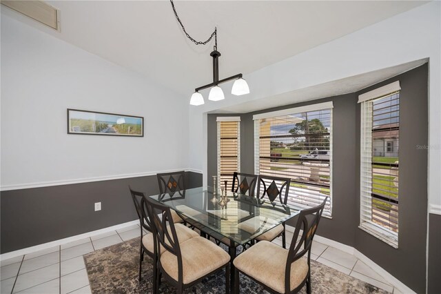 1 Sportsman Cir, Rotonda West, FL 33947 - dining space featuring light tile patterned floors and baseboards