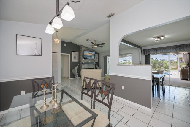 1 Sportsman Cir, Rotonda West, FL 33947 - dining space with lofted ceiling, a ceiling fan, and light tile patterned floors