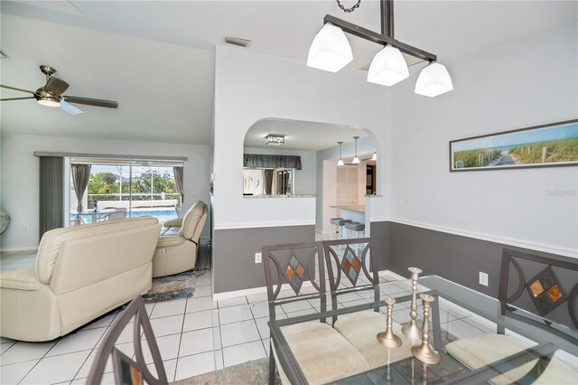1 Sportsman Cir, Rotonda West, FL 33947 - dining area featuring arched walkways, light tile patterned floors, and ceiling fan