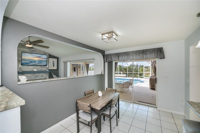 1 Sportsman Cir, Rotonda West, FL 33947 - dining area featuring lofted ceiling, light tile patterned floors, and a ceiling fan