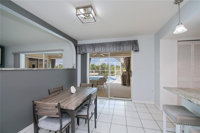 1 Sportsman Cir, Rotonda West, FL 33947 - dining area with baseboards and light tile patterned floors
