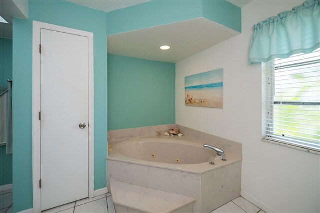 1 Sportsman Cir, Rotonda West, FL 33947 - full bath with a jetted tub and tile patterned floors