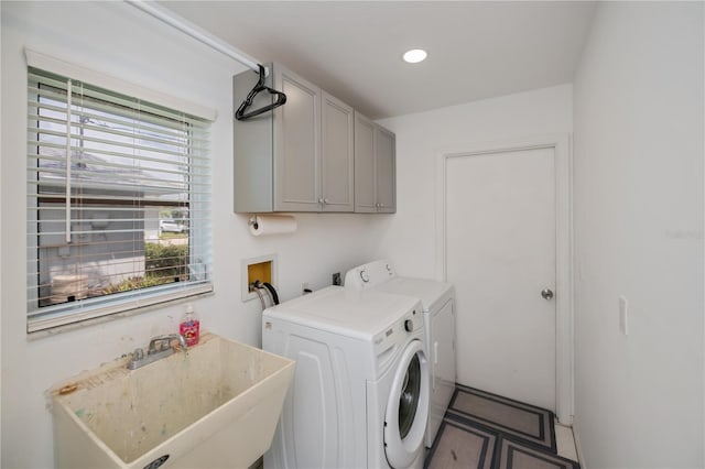 1 Sportsman Cir, Rotonda West, FL 33947 - laundry area with separate washer and dryer, cabinet space, and recessed lighting