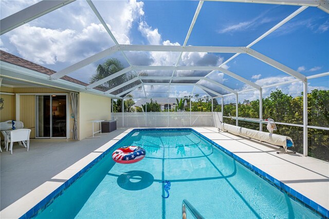 1 Sportsman Cir, Rotonda West, FL 33947 - view of swimming pool with a patio and a lanai