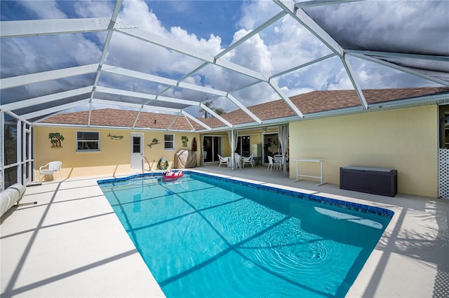 1 Sportsman Cir, Rotonda West, FL 33947 - outdoor pool with a patio and glass enclosure