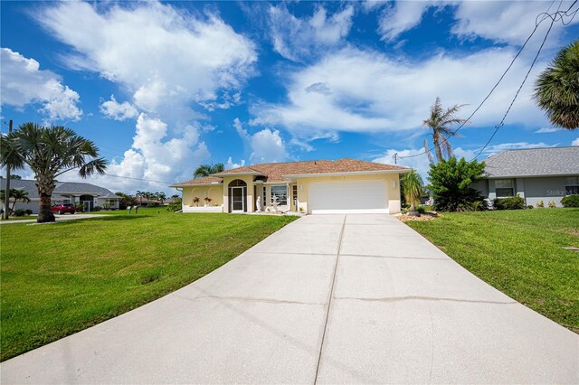 1 Sportsman Cir, Rotonda West, FL 33947 - single story home featuring a garage, a front lawn, concrete driveway, and stucco siding