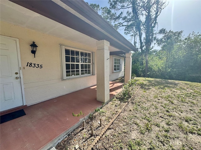 18335 Oxford Ave, Port Charlotte, FL 33948 - view of yard featuring a patio