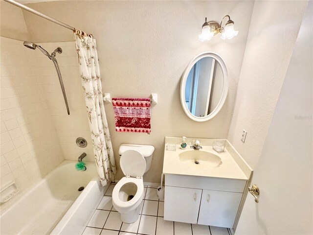 18335 Oxford Ave, Port Charlotte, FL 33948 - bathroom featuring tile patterned flooring, shower / bath combo with shower curtain, vanity, toilet, and baseboards