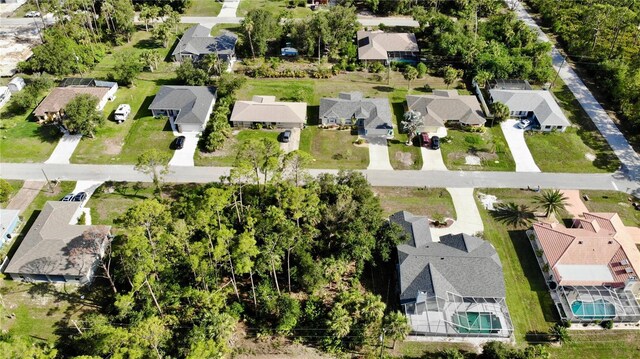18335 Oxford Ave, Port Charlotte, FL 33948 - aerial perspective of suburban area featuring a pool