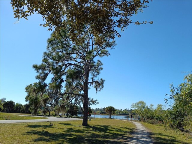 18335 Oxford Ave, Port Charlotte, FL 33948 - view of home's community featuring a water view and a lawn