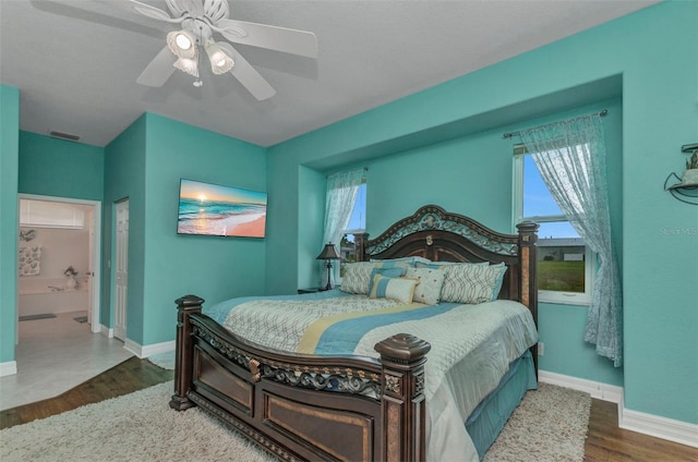 1499 Nuremberg Blvd, Punta Gorda, FL 33983 - bedroom featuring wood finished floors, multiple windows, and baseboards