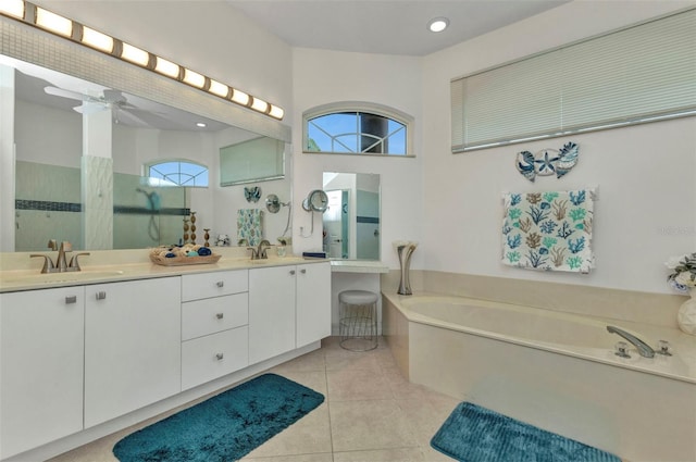 1499 Nuremberg Blvd, Punta Gorda, FL 33983 - bathroom featuring a bath, double vanity, tile patterned flooring, walk in shower, and ceiling fan