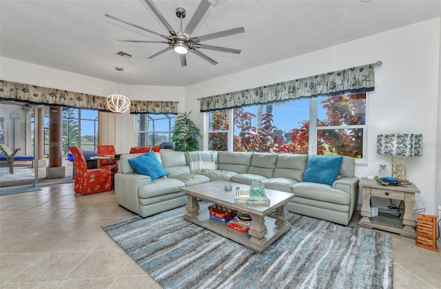 1499 Nuremberg Blvd, Punta Gorda, FL 33983 - living room with ceiling fan and tile patterned flooring