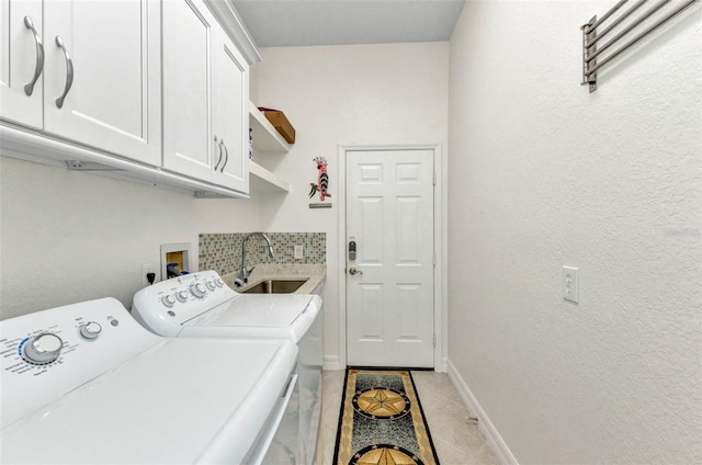 1499 Nuremberg Blvd, Punta Gorda, FL 33983 - washroom featuring cabinet space, washer and dryer, light tile patterned floors, and baseboards