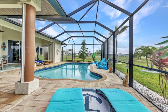 1499 Nuremberg Blvd, Punta Gorda, FL 33983 - swimming pool with a patio area, glass enclosure, and a lawn