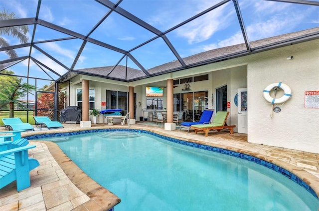 1499 Nuremberg Blvd, Punta Gorda, FL 33983 - swimming pool featuring a patio, a ceiling fan, and glass enclosure
