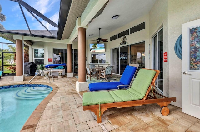 1499 Nuremberg Blvd, Punta Gorda, FL 33983 - view of patio with a lanai, an outdoor pool, ceiling fan, and outdoor dining area