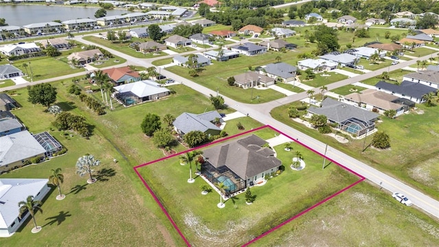 1499 Nuremberg Blvd, Punta Gorda, FL 33983 - aerial perspective of suburban area with a large body of water and property boundaries highlighted