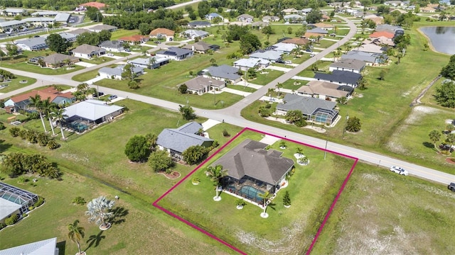 1499 Nuremberg Blvd, Punta Gorda, FL 33983 - aerial perspective of suburban area with property parcel outlined and a nearby body of water