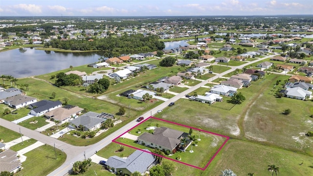 1499 Nuremberg Blvd, Punta Gorda, FL 33983 - aerial perspective of suburban area featuring a nearby body of water and property boundaries highlighted