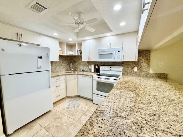 1515 Forrest Nelson Blvd Unit D102, Port Charlotte, FL 33952 - kitchen featuring white appliances, open shelves, tasteful backsplash, a sink, and recessed lighting