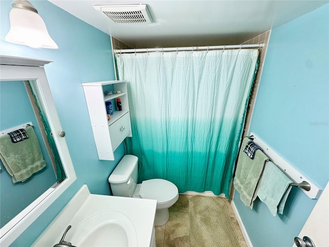 1515 Forrest Nelson Blvd Unit D102, Port Charlotte, FL 33952 - full bathroom featuring toilet, vanity, a shower with curtain, and tile patterned flooring