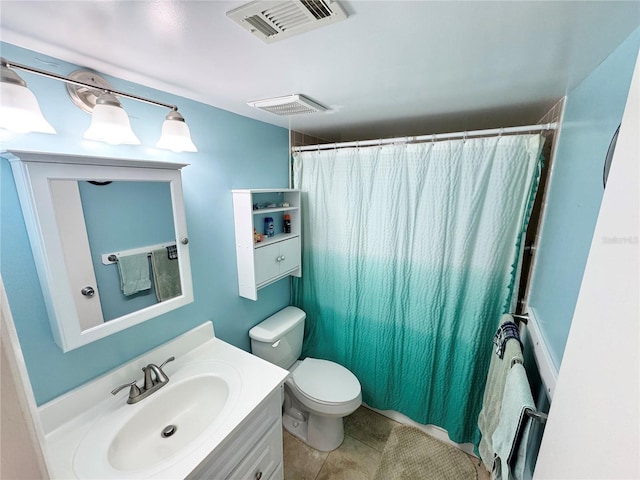 1515 Forrest Nelson Blvd Unit D102, Port Charlotte, FL 33952 - bathroom featuring vanity, toilet, tile patterned floors, and a shower with shower curtain