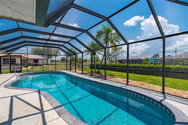 25371 Paladin Ln, Punta Gorda, FL 33983 - outdoor pool featuring a patio, a lawn, and a lanai