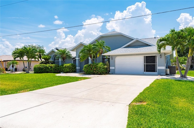 25371 Paladin Ln, Punta Gorda, FL 33983 - ranch-style house featuring stucco siding, central AC, driveway, a front lawn, and a garage